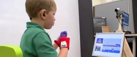 CopyCat: Helping Young Deaf Children Acquire Language Skills Using Sign Language Recognition